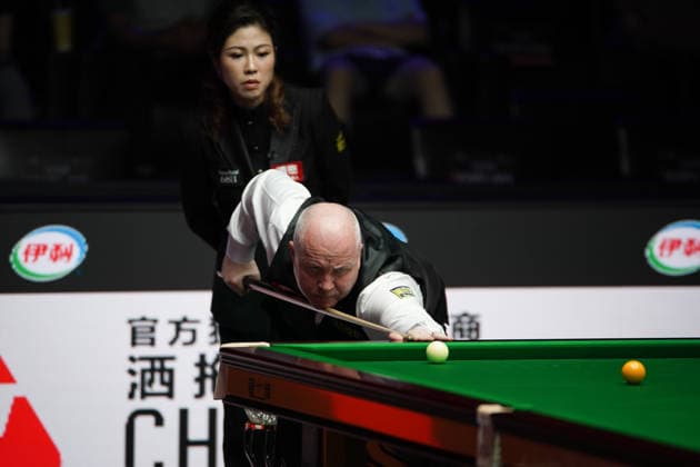 TAIYUAN, CHINA - AUGUST 11: John Higgins of Scotland plays a shot in the first round match against Stuart Bingham of England on day 4 of the 2026 World Snooker Tour China Open at Taiyuan Binhe Sports Center on August 11, 2026 in Taiyuan, Shanxi Province of China.  Copyright: xTaixChengzhex 111659329900
