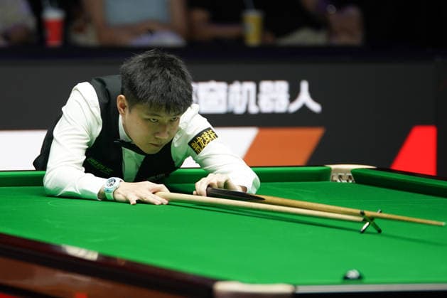 TAIYUAN, CHINA - AUGUST 11: Zhao Xintong of China plays a shot during his Round of 32 match against Zhang Anda of China at the 2026 Snooker China Open on August 11, 2026 in Taiyuan, Shanxi Province of China. The tournament features top snooker players competing for the championship title.  Copyright: xTaixChengzhex 111659394935