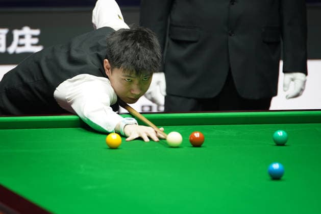 TAIYUAN, CHINA - AUGUST 11: Zhao Xintong of China plays a shot during his first round match against Zhang Anda of China at the 2026 Snooker China Open on August 11, 2026 in Taiyuan, Shanxi Province of China. The tournament features 32 top players competing for the title.  Copyright: xTaixChengzhex 111659394937
