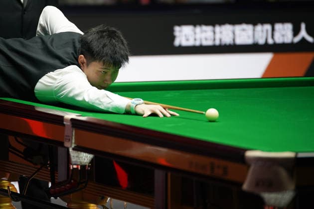 TAIYUAN, CHINA - AUGUST 11: Zhao Xintong of China plays a shot during his first round match against Zhang Anda of China at the 2026 China Open Snooker on August 11, 2026 in Taiyuan, Shanxi Province of China. The tournament features 32 top players competing for the title.  Copyright: xTaixChengzhex 111659394930