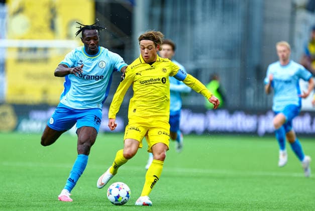 Fotball, Champions League 2025 2026: Bodo Glimt - Union Saint-Gilloise Bodo 20260811. Promise David og Patrick Berg under kvalifiseringskampen til Champions League mellom Bodo Glimt og Union Saint-Gilloise pa Aspmyra stadion. Foto: Mats Torbergsen NTB Bodo Norge EDITORIAL USE ONLY. RESTRICTED USE FOR BETTING COMPANIES Ref:_SPOlVhoYQuIN5M.jpg *** Soccer, Champions League 2025–2026 Bodo Glimt vs. Union Saint-Gilloise Bodo 20260811 Promise David and Patrick Berg during the Champions League qualifying match between Bodo Glimt and Union Saint-Gilloise at Aspmyra Stadium Photo: Mats Torbergsen, NTB Bodo, Norway EDITORIAL USE ONLY; RESTRICTED USE FOR BETTING COMPANIES  Copyright: xMatsxTorbergsenx xNTBx