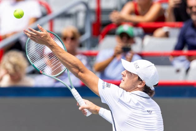 August 11, 2026, Montreal, Quebec, Canada: LUCIANO DARDERI (19) from Italia serving in match against Brandon Nakashima (28) from USA in quarter final at Canadian Open at IGA stadium in Montreal, Quebec, Canada on 2026-08-11 TENNIS: Canadian Open Montreal 2026  - ZUMAl189 20260811_zsp_l189_003 Copyright: xYannickxLegarex