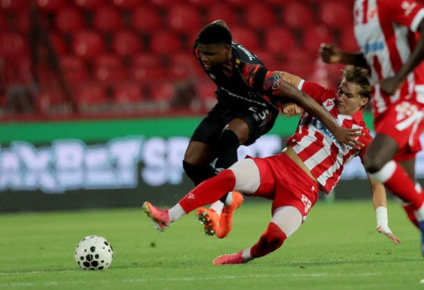 Crvena Zvezda v Hapoel Beer Sheva, UEFA Champions League, third qualifying round, 2nd leg Season 2026 2027 Belgrade, Serbia. 11th August, 2026. Hapoel s Lucas Ventura (L) vies with Crvena Zvezda s Vasilije Kostov (R) during the UEFA Champions League, third qualifying round, 2nd leg football match between Crvena Zvezda (Red Star) and Hapoel Beer-Sheva at the Rajko Mitic Stadium on August 11, 2026 in Belgrade, Serbia. Belgrade Serbia Copyright: xPedjaxMilosavljevicx x
