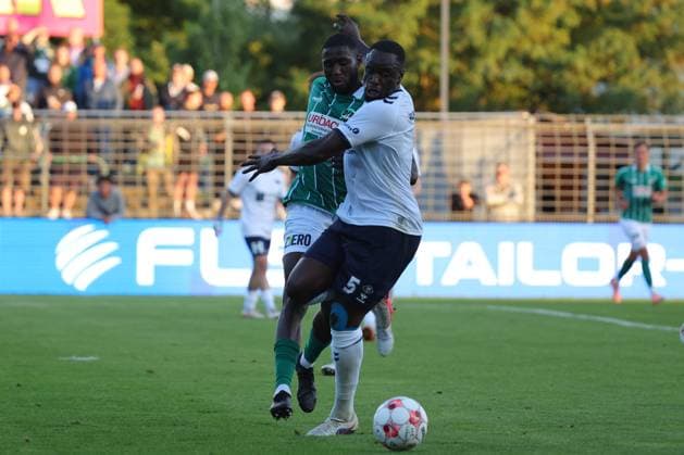 11.08.26, GER, Regionalliga Nord, Fussball, 1. Spieltag, Saison 2026 2027, Dietmar-Scholze-Stadion an der Lohmuehle, VfB Lübeck vs VfB Oldenburg Daouda Beleme (VfB Luebeck 21) im Zweikampf gegen Anouar Adam (VfB Oldenburg 05) Foto nordphoto GmbH Tauchnitz Luebeck Dietmar-Scholze-Stadion an der Lohmuehle SH Germany *** August 26, 2026, GER, Regionalliga Nord, Soccer, Matchday 1, 2026–2027 Season, Dietmar Scholze Stadium an der Lohmuehle, VfB Lübeck vs. VfB Oldenburg: Daouda Beleme (VfB Lübeck 21) in a tackle against Anouar Adam (VfB Oldenburg 05). Photo: nordphoto GmbH, Tauchnitz, Lübeck, Dietmar Scholze Stadium an der Lohmuehle, SH, Germany Copyright: xnordphotoxGmbHx xTauchnitzx