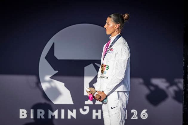 RECORD DATE NOT STATED 11th August 2026; Alexander Stadium, Birmingham, Midlands, England; 2026 European Athletics Championships, Day Two; Amy Hunt (GBR) stands on the podium and celebrates winning gold in the womens 100m final GodfreyxPitt