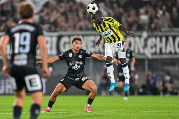 SOCCER - UEFA CL, Sturm vs Fenerbahce GRAZ,AUSTRIA,11.AUG.26 - SOCCER - UEFA Champions League, qualification, SK Sturm Graz vs Fenerbahce Istanbul. Image shows Jacob Hoedl (Sturm) and N Golo Kante (Fenerbahce).  GEPAxpictures xAvnixRetkoceri