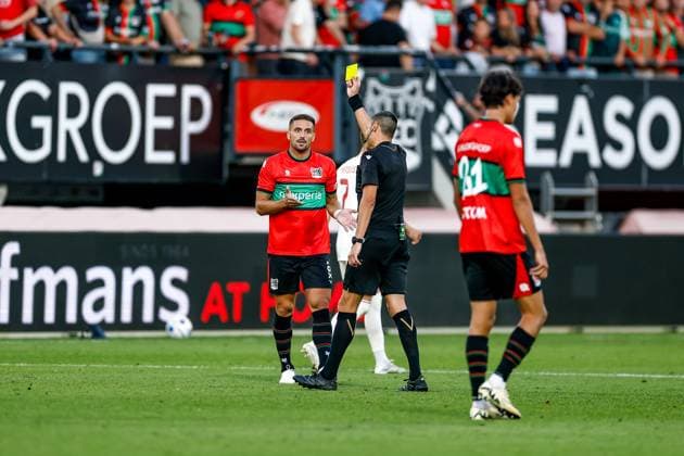 NIJMEGEN , 08-07-2026 , Stadium De Goffert , season 2026 2027 , Third qualifying round UEFA Champions League 2nd leg football , match between NEC Nijmegen and Olympiacos , picture shows NEC player Dusan Tadic and Referee Maurizio Mariani NEC - Olympiacos  x205634357x Copyright: