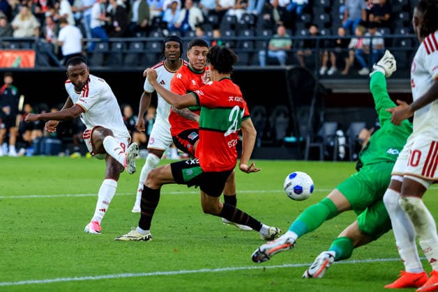 NIJMEGEN, NETHERLANDS - AUGUST 11: Ayoub El Kaabi of Olympiacos shoots to score his team s first goal during the UEFA Champions League 2026 27 third qualifying round second leg match between NEC Nijmegen and Olympiacos at the Goffertstadion on August 11, 2026 in Nijmegen, Netherlands.  Copyright: xRenexNijhuis MBxMediax