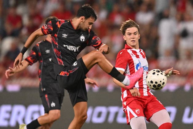 CRVENA ZVEZDA vs HAPOEL BEER SHEVA VASILIJE KOSTOV vs GUY MIZRAHI football Crvena zvezda vs Hapoel Ber Sheva Champions league qualification match at Rajko Mitic stadium , Belgrade 27.08.2026 PHOTO FOOTBALL, CRVENA ZVEZDA, RED STAR, UEFA CHAMPIONS LEAGUE QUALIFICATIONS, HAPOEL BEER SHEVA Belgrade Rajko Mitic stadium Serbia Copyright: xMarkoxMetlasx xMNxPressx