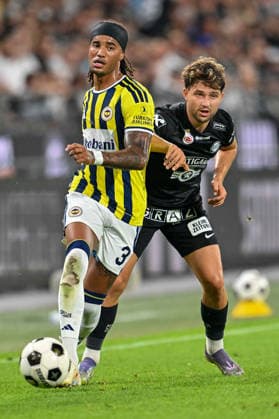 SOCCER - UEFA CL, Sturm vs Fenerbahce GRAZ,AUSTRIA,11.AUG.26 - SOCCER - UEFA Champions League, qualification, SK Sturm Graz vs Fenerbahce Istanbul. Image shows Archie Brown (Fenerbahce) and Simon Seidl (Sturm).  GEPAxpictures xAvnixRetkoceri