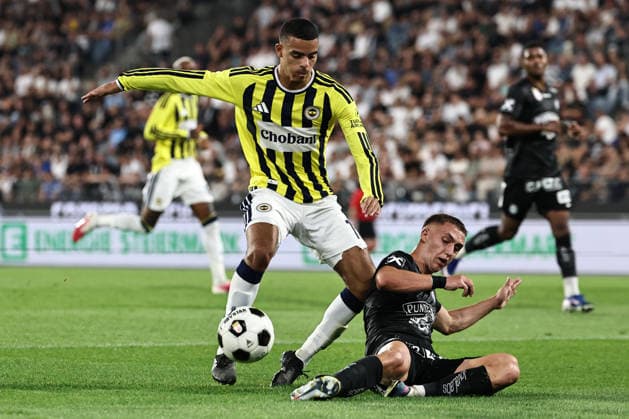 SOCCER - UEFA CL, Sturm vs Fenerbahce GRAZ,AUSTRIA,11.AUG.26 - SOCCER - UEFA Champions League, qualification, SK Sturm Graz vs Fenerbahce Istanbul. Image shows Mason Greenwood (Fenerbahce) and Petar Petrovic (Sturm).  GEPAxpictures xChrisxBauer