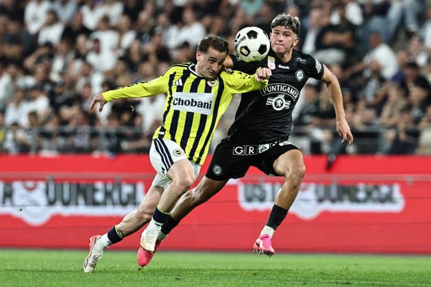 SOCCER - UEFA CL, Sturm vs Fenerbahce GRAZ,AUSTRIA,11.AUG.26 - SOCCER - UEFA Champions League, qualification, SK Sturm Graz vs Fenerbahce Istanbul. Image shows Kerem Aktuerkoglu (Fenerbahce) and Arjan Malic (Sturm).  GEPAxpictures xChrisxBauer