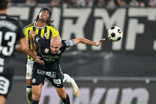 SOCCER - UEFA CL, Sturm vs Fenerbahce GRAZ,AUSTRIA,11.AUG.26 - SOCCER - UEFA Champions League, qualification, SK Sturm Graz vs Fenerbahce Istanbul. Image shows Archie Brown (Fenerbahce) and Jon Gorenc Stankovic (Sturm).  GEPAxpictures xAvnixRetkoceri