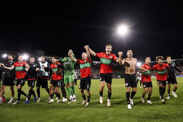 NIJMEGEN - NEC players celebrate the 2-1 victory during the 3rd Champions League qualifying round between NEC and Olympiakos Piraeus at De Goffert on August 11, 2026, in Nijmegen, the Netherlands. BART STOUTJESDIJK ANP UEFA Champion League Third qualifying round 2nd leg 2026-2027 xVIxANPxSportx xxANPxIVx 565286084 originalFilename: 565286084.jpg