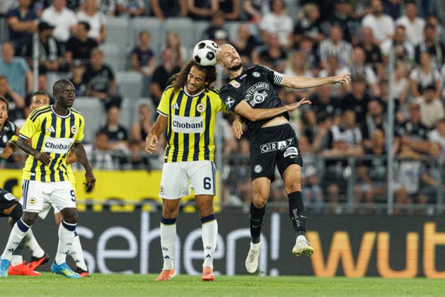 Matteo Guendouzi of Fenerbahce and Jon Gorenc Stankovic of Sturm seen during UEFA Champions League third round qualifying game between teams of SK Sturm Graz and Fenerbahce SK (Maciej Rogowski Ball Raw Images) Graz Dalymount Park Austria Copyright: xMaciejxRogowskix sturmfenerbahce2627_1-102