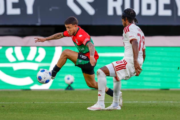 2026-08-11 NEC Nijmegen v Olympiacos - Champions League qualifying phase NIJMEGEN, NETHERLANDS - AUGUST 11: Emre Mor of NEC Nijmegen, Bruno Onyemaechi of Olympiakos Piraeus during the Champions League qualifying phase match between NEC Nijmegen and Olympiacos at Goffertstadion on August 11, 2026 in Nijmegen, Netherlands. Nijmegen Goffertstadion Netherlands Content not available for redistribution in The Netherlands directly or indirectly through any third parties. Copyright: xBenxGalx