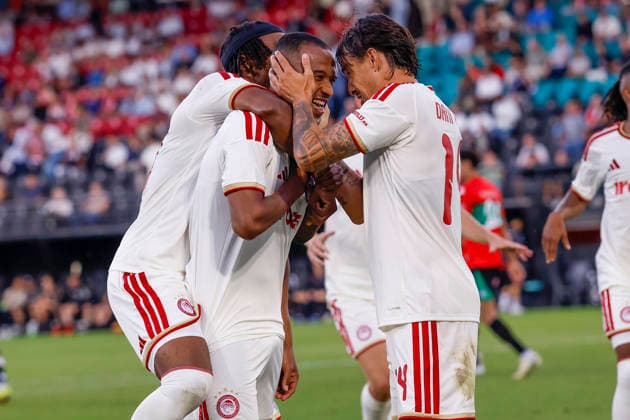 2026-08-11 NEC Nijmegen v Olympiacos - Champions League qualifying phase NIJMEGEN, NETHERLANDS - AUGUST 11: Bruno Onyemaechi of Olympiakos Piraeus, Ayoub El Kaabi of Olympiakos Piraeus celebrates after scoring his teams first goal, Dani Garcia of Olympiakos Piraeus during the Champions League qualifying phase match between NEC Nijmegen and Olympiacos at Goffertstadion on August 11, 2026 in Nijmegen, Netherlands. Nijmegen Goffertstadion Netherlands Content not available for redistribution in The Netherlands directly or indirectly through any third parties. Copyright: xBenxGalx