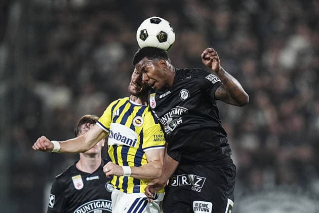 Sturm Graz v Fenerbahce - UEFA Champions League GRAZ, AUSTRIA - AUGUST 11: Jeyland Mitchell (R) of Sturm Graz in action against Ismail Yuksek (L) of Fenerbahce during the UEFA Champions League third qualifying round second-leg match between Sturm Graz and Fenerbahce at Liebenau Stadium in Graz, Austria on August 11, 2026. Agit Erdi Ulukaya Anadolu Graz Austria. Editorial use only. Please get in touch for any other usage.  Copyright: x2026xAnadoluxAgitxErdixUlukayax