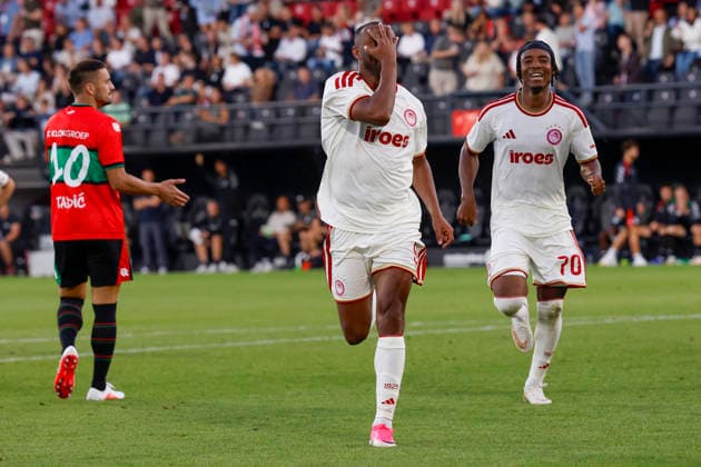 2026-08-11 NEC Nijmegen v Olympiacos - Champions League qualifying phase NIJMEGEN, NETHERLANDS - AUGUST 11: Dusan Tadic of NEC Nijmegen, Ayoub El Kaabi of Olympiakos Piraeus celebrates after scoring his teams first goal, n70 during the Champions League qualifying phase match between NEC Nijmegen and Olympiacos at Goffertstadion on August 11, 2026 in Nijmegen, Netherlands. Nijmegen Goffertstadion Netherlands Content not available for redistribution in The Netherlands directly or indirectly through any third parties. Copyright: xBenxGalx