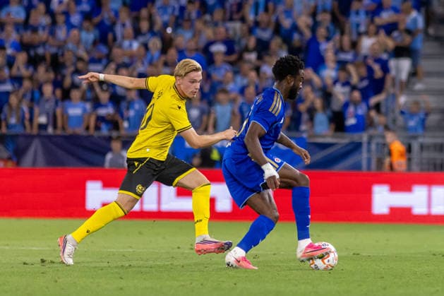 Jeppe Kjaer of Mjallby and Sandro Cruz of SK Slovan Bratislava seen during UEFA Champions league third qualifying round game between teams of SK Slovan Bratislava and Mjallby (Dominika Kortvelyesiova Ball Raw Images) Bratislava Tehelne Pole stadium Slovakia Copyright: xDominikaxKortvelyesiovax DKOR1251
