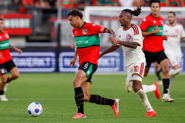 2026-08-11 NEC Nijmegen v Olympiacos - Champions League qualifying phase NIJMEGEN, NETHERLANDS - AUGUST 11: Deveron Fonville of NEC Nijmegen, Gelson Martins of Olympiakos Piraeus during the Champions League qualifying phase match between NEC Nijmegen and Olympiacos at Goffertstadion on August 11, 2026 in Nijmegen, Netherlands. Nijmegen Goffertstadion Netherlands Content not available for redistribution in The Netherlands directly or indirectly through any third parties. Copyright: xBenxGalx