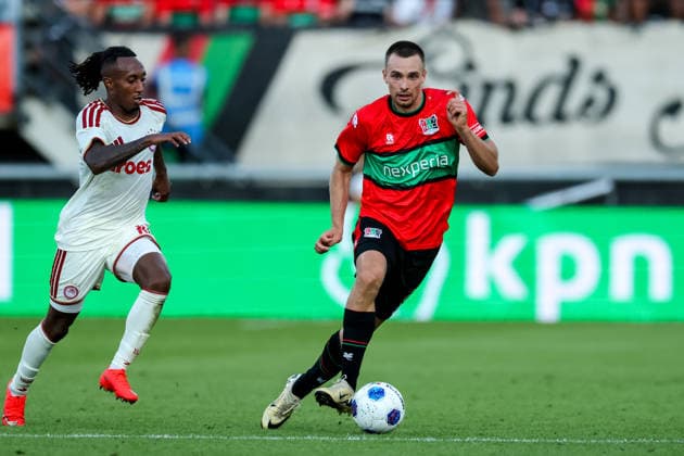 NIJMEGEN, NETHERLANDS - AUGUST 11: Darko Nejasmic of NEC Nijmegen dribbles with the ball during the UEFA Champions League 2026 27 third qualifying round second leg match between NEC Nijmegen and Olympiacos at the Goffertstadion on August 11, 2026 in Nijmegen, Netherlands.  Copyright: xRenexNijhuis MBxMediax