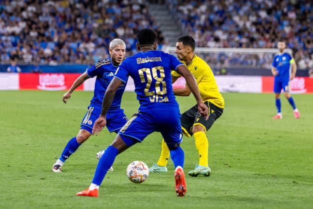 Cristian Martinez of SK Slovan Bratislava, Cesar Blackman of SK Slovan Bratislava and Ali Youssef of Mjallby seen during UEFA Champions league third qualifying round game between teams of SK Slovan Bratislava and Mjallby (Dominika Kortvelyesiova Ball Raw Images) Bratislava Tehelne Pole stadium Slovakia Copyright: xDominikaxKortvelyesiovax DKR_5896