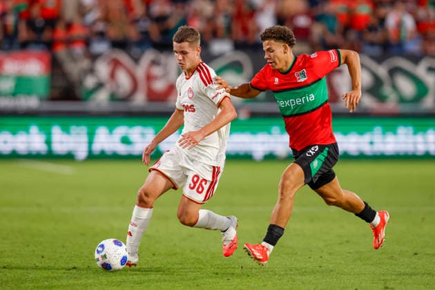 2026-08-11 NEC Nijmegen v Olympiacos - Champions League qualifying phase NIJMEGEN, NETHERLANDS - AUGUST 11: Christos Mouzakitis of Olympiakos Piraeus, Clement Boschoff of NEC Nijmegen during the Champions League qualifying phase match between NEC Nijmegen and Olympiacos at Goffertstadion on August 11, 2026 in Nijmegen, Netherlands. Nijmegen Goffertstadion Netherlands Content not available for redistribution in The Netherlands directly or indirectly through any third parties. Copyright: xBenxGalx