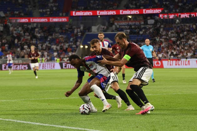 Asger Sorensen and Ernest Nuamah seen during UEFA Champions League third round qualifying game between teams of Olympique Lyonnais Lyon and Sparta Praha (Quentin Motiel-Font Ball Raw Images) Decines-Charpieu Groupama Stadium France Copyright: xQuentinxMontiel-Fontx QuentinLyonspart262700027