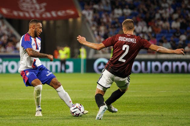 Martin Suchomel and Corentin Tolisso seen during UEFA Champions League third round qualifying game between teams of Olympique Lyonnais Lyon and Sparta Praha (Quentin Motiel-Font Ball Raw Images) Decines-Charpieu Groupama Stadium France Copyright: xQuentinxMontiel-Fontx QuentinLyonspart262700033