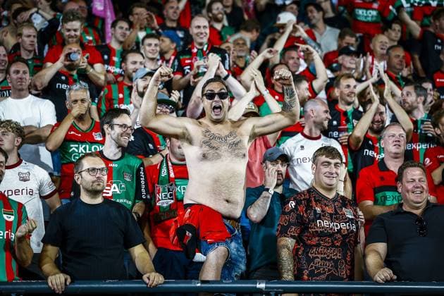 NIJMEGEN , 08-07-2026 , Stadium De Goffert , season 2026 2027 , Third qualifying round UEFA Champions League 2nd leg football , match between NEC Nijmegen and Olympiacos , picture shows fans celebrating the win. Final score 2-1. NEC - Olympiacos  x205637736x Copyright: