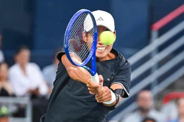 MONTREAL, QC - AUGUST 11: Learner Tien (USA) returns the ball during a quarterfinal match at National Bank Open on August 11, 2026 at IGA Stadium in Montreal, QC (Photo by David Kirouac Icon Sportswire) TENNIS: AUG 11 National Bank Open EDITORIAL USE ONLY Icon26081104526