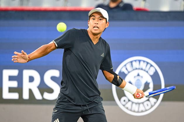 MONTREAL, QC - AUGUST 11: Learner Tien (USA) returns the ball during a quarterfinal match at National Bank Open on August 11, 2026 at IGA Stadium in Montreal, QC (Photo by David Kirouac Icon Sportswire) TENNIS: AUG 11 National Bank Open EDITORIAL USE ONLY Icon26081105526