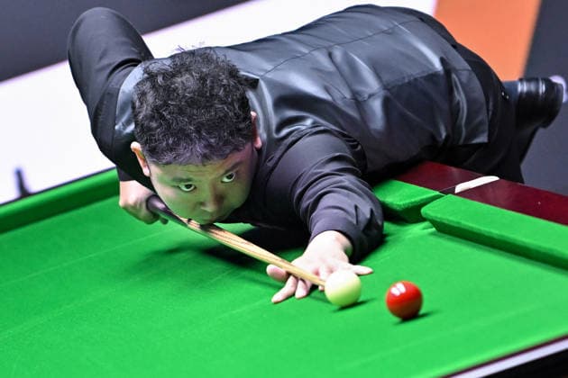 TAIYUAN, CHINA - AUGUST 11: Zhang Anda of China plays a shot in the first round match against Zhao Xintong of China on day 4 of the 2026 World Snooker Tour China Open at Taiyuan Binhe Sports Center on August 11, 2026 in Taiyuan, Shanxi Province of China.  Copyright: xChinaxNewsxServicex 111659472004