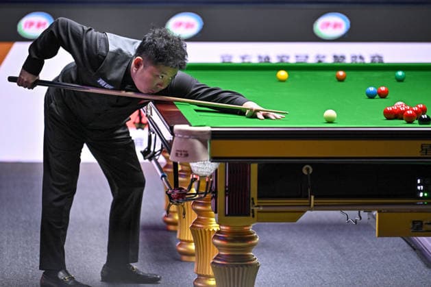 TAIYUAN, CHINA - AUGUST 11: Zhang Anda of China plays a shot in the first round match against Zhao Xintong of China on day 4 of the 2026 World Snooker Tour China Open at Taiyuan Binhe Sports Center on August 11, 2026 in Taiyuan, Shanxi Province of China.  Copyright: xChinaxNewsxServicex 111659472250