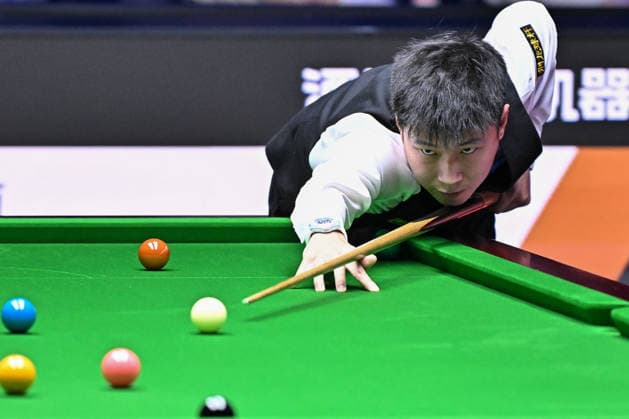 TAIYUAN, CHINA - AUGUST 11: Zhao Xintong of China plays a shot in the first round match against Zhang Anda of China on day 4 of the 2026 World Snooker Tour China Open at Taiyuan Binhe Sports Center on August 11, 2026 in Taiyuan, Shanxi Province of China.  Copyright: xChinaxNewsxServicex 111659470768