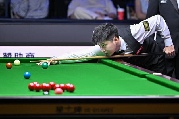 TAIYUAN, CHINA - AUGUST 11: Zhao Xintong of China plays a shot in the first round match against Zhang Anda of China on day 4 of the 2026 World Snooker Tour China Open at Taiyuan Binhe Sports Center on August 11, 2026 in Taiyuan, Shanxi Province of China.  Copyright: xChinaxNewsxServicex 111659471095