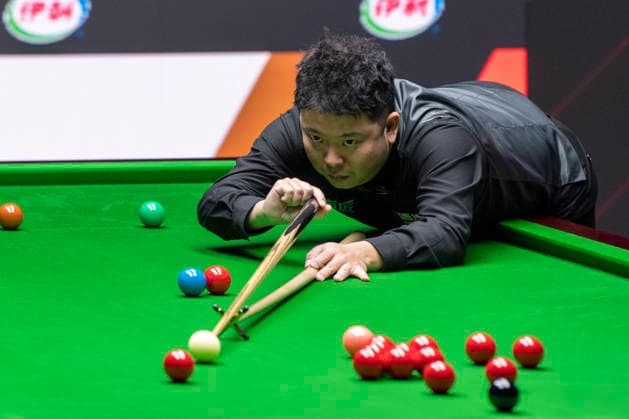 (260812) -- TAIYUAN, Aug. 12, 2026 -- Zhang Anda of China competes during the round 1 match between Zhao Xintong of China and Zhang Anda of China at China Open 2026 snooker tournament in Taiyuan, north China s Shanxi Province, Aug. 11, 2026. ) (SP)CHINA-TAIYUAN-SNOOKER-CHINA OPEN-ROUND 1 (CN) CaoxYang 