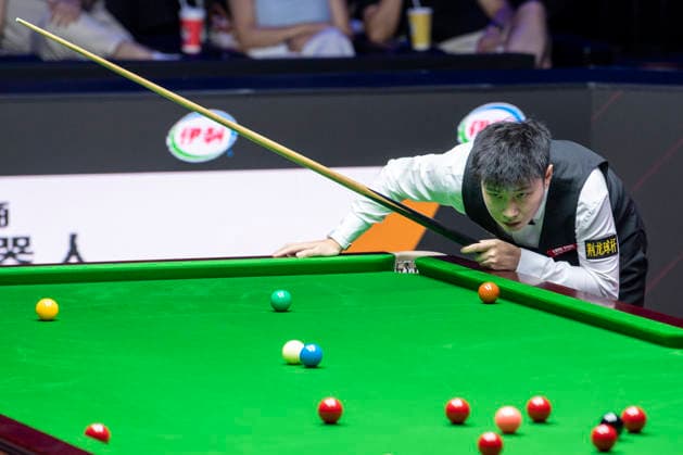 (260812) -- TAIYUAN, Aug. 12, 2026 -- Zhao Xintong of China competes during the round 1 match between Zhao Xintong of China and Zhang Anda of China at China Open 2026 snooker tournament in Taiyuan, north China s Shanxi Province, Aug. 11, 2026. ) (SP)CHINA-TAIYUAN-SNOOKER-CHINA OPEN-ROUND 1 (CN) CaoxYang 