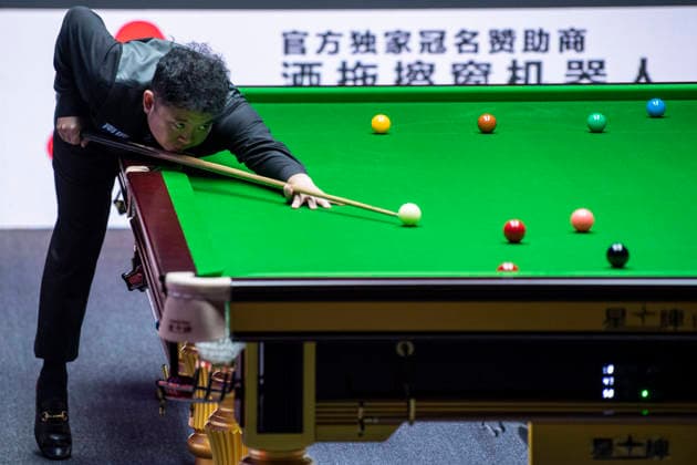 (260812) -- TAIYUAN, Aug. 12, 2026 -- Zhang Anda of China competes during the round 1 match between Zhao Xintong of China and Zhang Anda of China at China Open 2026 snooker tournament in Taiyuan, north China s Shanxi Province, Aug. 11, 2026. ) (SP)CHINA-TAIYUAN-SNOOKER-CHINA OPEN-ROUND 1 (CN) CaoxYang 