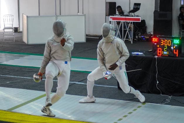 LAGOS, NIGERIA - AUGUST 11: Akinyosoye Oluwafolayemi, Nigeria and Bright Hentry Bebit, India during the 2026 Commonwealth Fencing Federation Championships - Senior Men s saber between Nigeria and India at Rugby School Eko Atlantic on August 11, 2026 in Lagos, Nigeria. Photo by Segun Ogunfeyitimi Copyright: xshengolpixsx