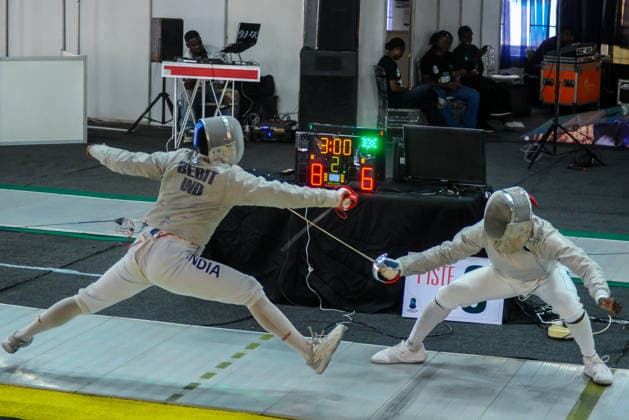Sport Bilder des Tages #2 LAGOS, NIGERIA - AUGUST 11: Akinyosoye Oluwafolayemi, Nigeria and Bright Hentry Bebit, India during the 2026 Commonwealth Fencing Federation Championships - Senior Men s saber between Nigeria and India at Rugby School Eko Atlantic on August 11, 2026 in Lagos, Nigeria. Photo by Segun Ogunfeyitimi Copyright: xshengolpixsx