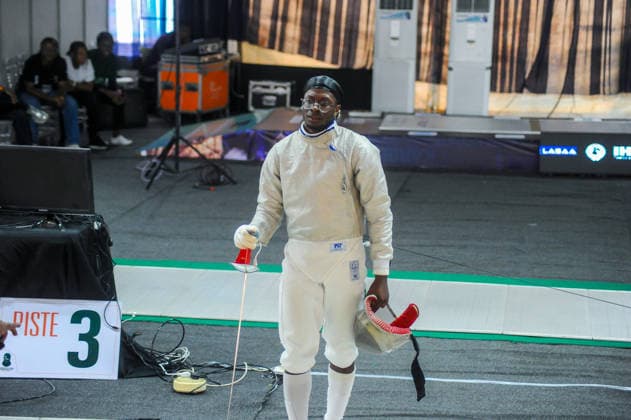 LAGOS, NIGERIA - AUGUST 11: Akinyosoye Oluwafolayemi, Nigeria and Bright Hentry Bebit, India during the 2026 Commonwealth Fencing Federation Championships - Senior Men s saber between Nigeria and India at Rugby School Eko Atlantic on August 11, 2026 in Lagos, Nigeria. Photo by Segun Ogunfeyitimi Copyright: xshengolpixsx