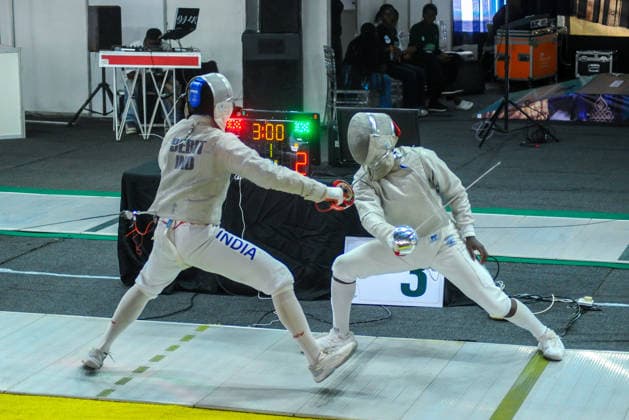 LAGOS, NIGERIA - AUGUST 11: Akinyosoye Oluwafolayemi, Nigeria and Bright Hentry Bebit, India during the 2026 Commonwealth Fencing Federation Championships - Senior Men s saber between Nigeria and India at Rugby School Eko Atlantic on August 11, 2026 in Lagos, Nigeria. Photo by Segun Ogunfeyitimi Copyright: xshengolpixsx