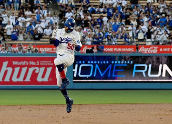 Los Angeles Dodgers shortstop Mookie Betts rounds the bases after hitting a solo homer in the second inning against the Kansas City Royals at Dodger Stadium in Los Angeles on Tuesday, August 11, 2026.  LAP2026081106 JIMxRUYMEN