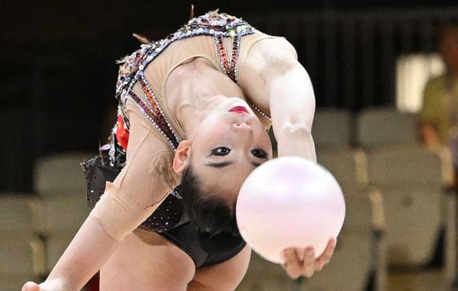 12.08.2026, xhbx, Rhythmische Sportgymnastik Weltmeisterschaft 2026, v.l. Qi Wang (China) (DFL DFB REGULATIONS PROHIBIT ANY USE OF PHOTOGRAPHS as IMAGE SEQUENCES and or QUASI-VIDEO) Frankfurt am Main *** August 12, 2026, xhbx, 2026 Rhythmic Gymnastics World Championships, from left: Qi Wang, China; DFL; DFB. REGULATIONS PROHIBIT ANY USE OF PHOTOGRAPHS AS IMAGE SEQUENCES AND OR QUASI-VIDEO. Frankfurt am Main