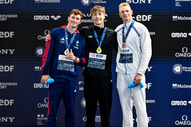 Maxime Grousset of France, silver, Egor Kornev Neutral Athlete B, gold, Grigori Pekarski Neutral Athlete A, bronze show the medals after competing in the swimming 50m Butterfly Men Final during the European Aquatics Championships at the Olympic Aquatic Center in Paris (France), August 11, 2026. Andrea Masini Deepbluemedia Insidefoto