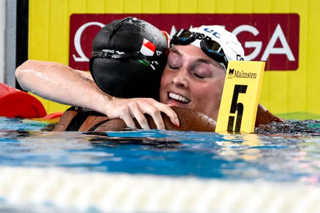 Sara Curtis of Italy, bronze, Marrit Steenbergen of Netherlands, gold, react after competing in the swimming 100m Freestyle Women Final during the European Aquatics Championships at the Olympic Aquatic Center in Paris (France), August 11, 2026. Andrea Staccioli
