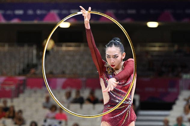 12.08.2026, xhbx, Rhythmische Sportgymnastik Weltmeisterschaft 2026, v.l. Qi Wang (China) Reifenübung (DFL DFB REGULATIONS PROHIBIT ANY USE OF PHOTOGRAPHS as IMAGE SEQUENCES and or QUASI-VIDEO) Frankfurt am Main *** August 12, 2026, xhbx, 2026 Rhythmic Gymnastics World Championships, from left: Qi Wang (China), hoop routine. DFL and DFB regulations prohibit any use of photographs as image sequences and or quasi-video. Frankfurt am Main