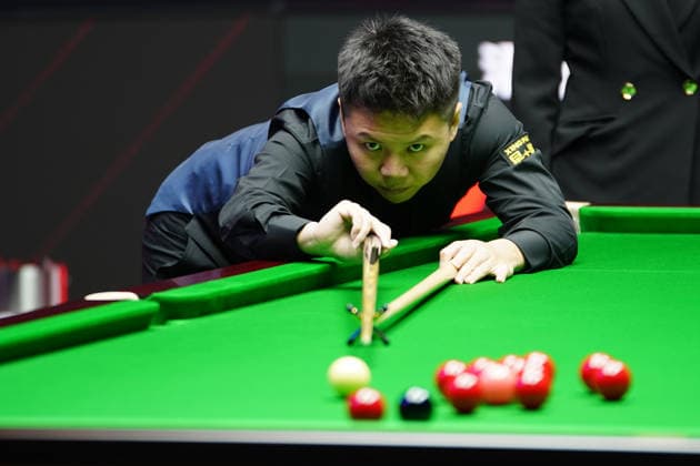 TAIYUAN, CHINA - AUGUST 12: Zhou Yuelong of China plays a shot in the second round match against Liu Hongyu of China on day 5 of the 2026 World Snooker Tour China Open at Taiyuan Binhe Sports Center on August 12, 2026 in Taiyuan, Shanxi Province of China.  Copyright: xTaixChengzhex 111659519969